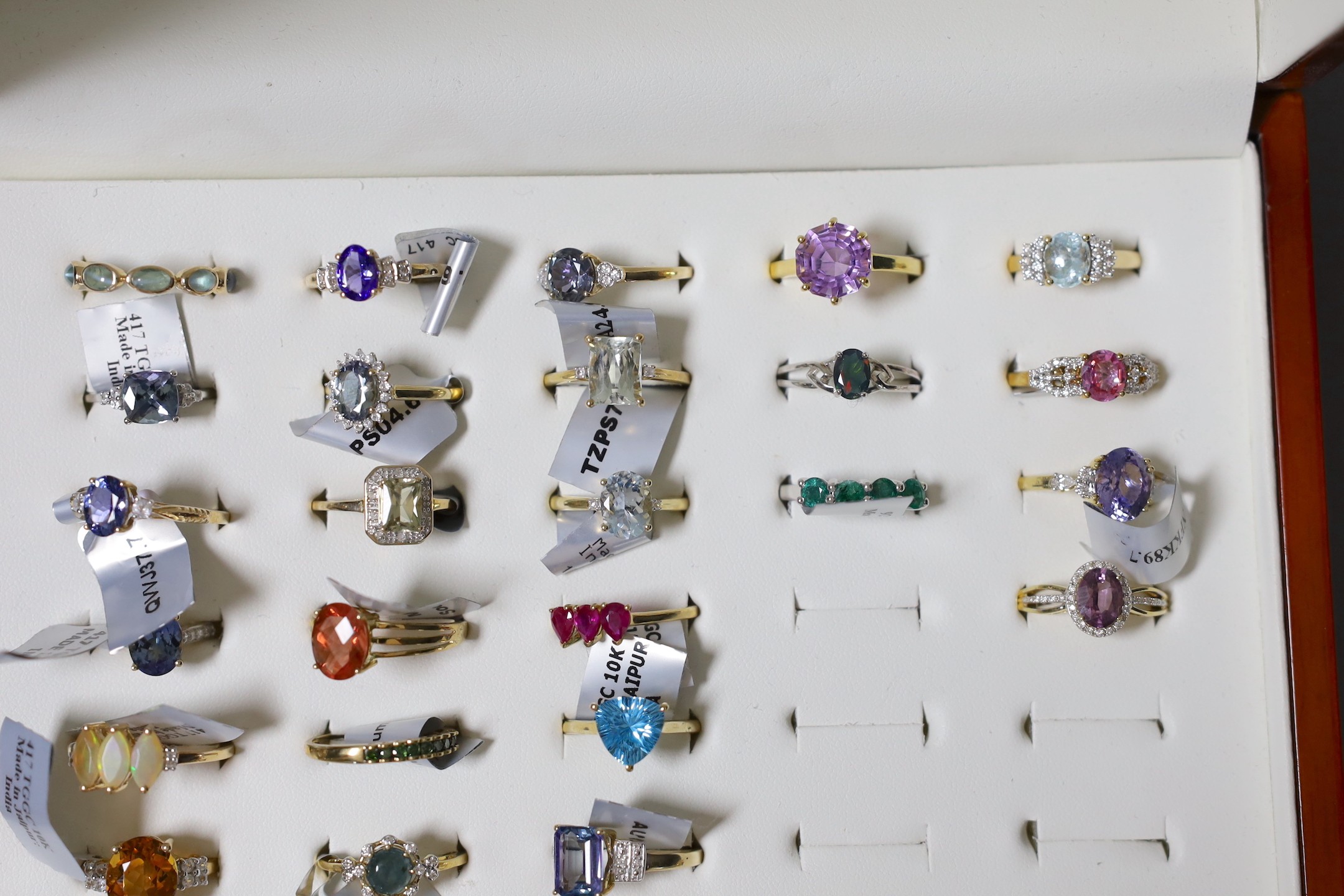 A collection of thirty four modern 9ct gold and gem set dress rings, four similar 18ct gold and gem set rings, four 14ct gold and gem set rings and three 925 rings.